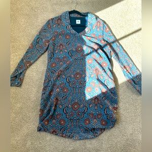 Size M tunic/ dress from CAbi. Light blue with flowers! Casual and dressy!